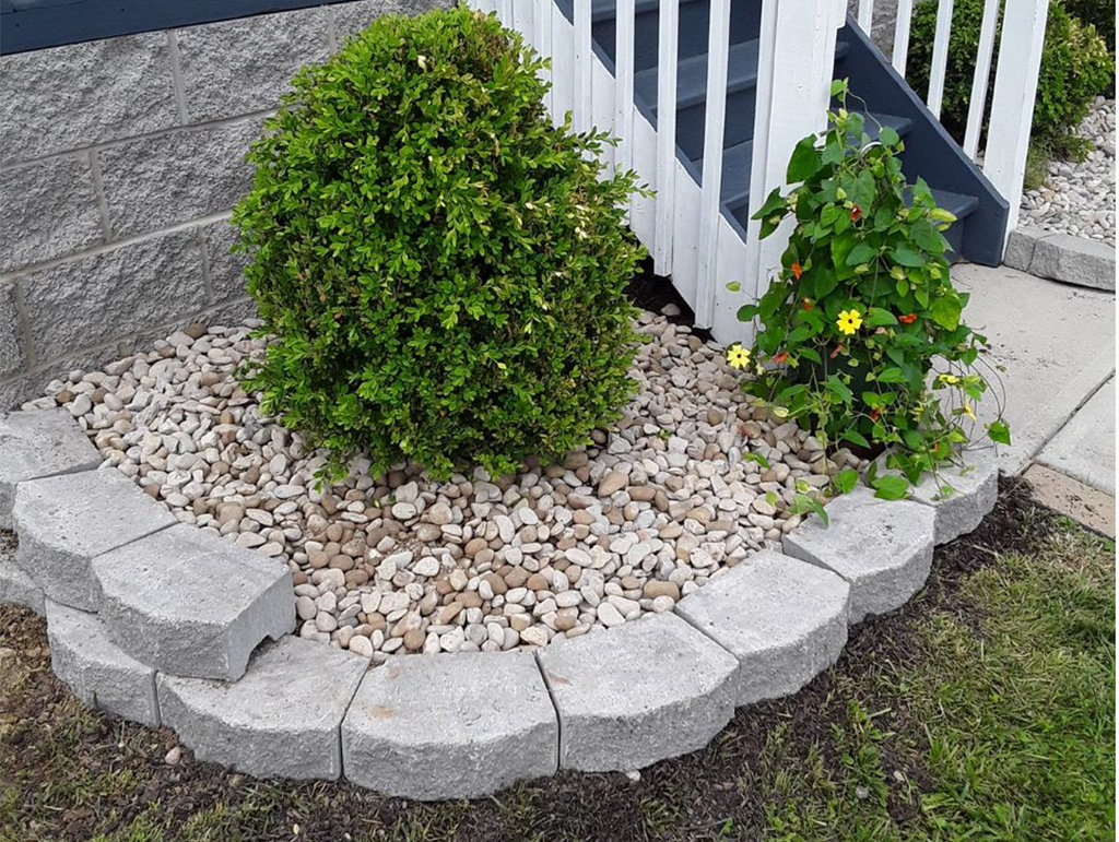 Ideal Supplies use of retaining stones for small area landscaping.