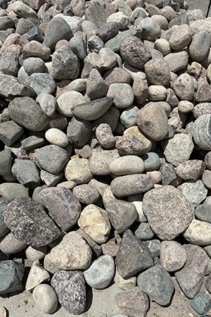 Ideal Supplies WC Wisconsin Cobbles Landscape Gravel. Ideal Supplies has 4 inch to 7 inch varied gary colored decorative landscape rocks for your next project.